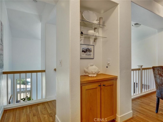 hallway featuring light hardwood / wood-style floors