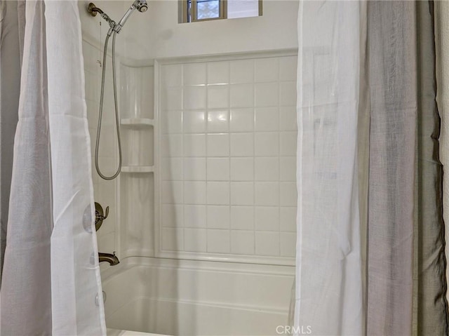 bathroom featuring shower / tub combo