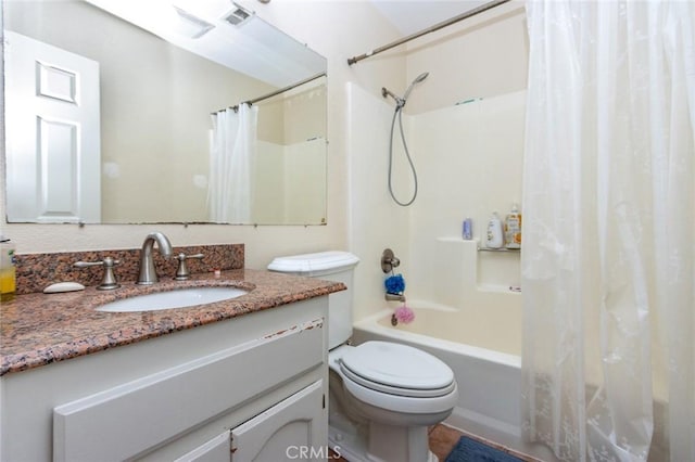 full bathroom featuring toilet, shower / bathtub combination with curtain, and vanity