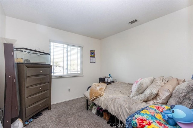 bedroom with light carpet