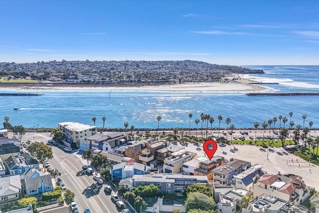 bird's eye view with a water view and a view of the beach