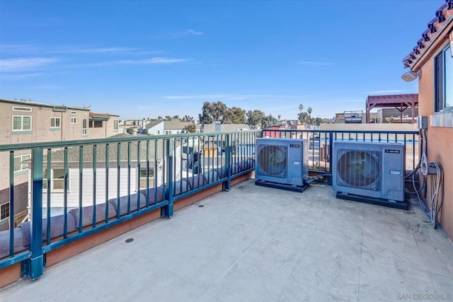 balcony featuring ac unit