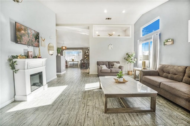 living room with vaulted ceiling