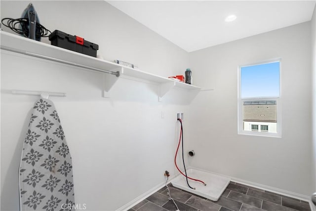 clothes washing area featuring washer hookup