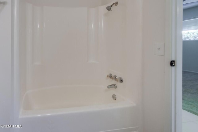 bathroom with shower / bathing tub combination