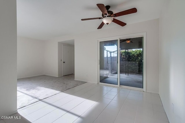 spare room with light tile patterned floors