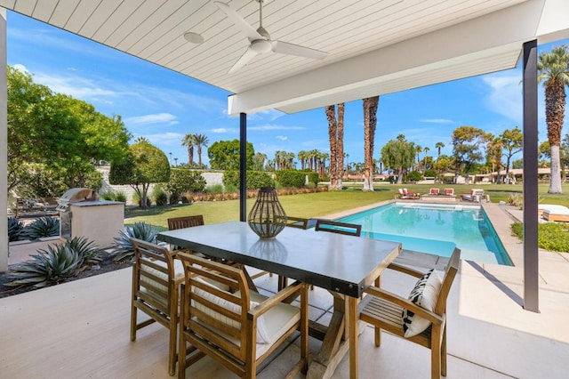 view of patio / terrace with ceiling fan and area for grilling