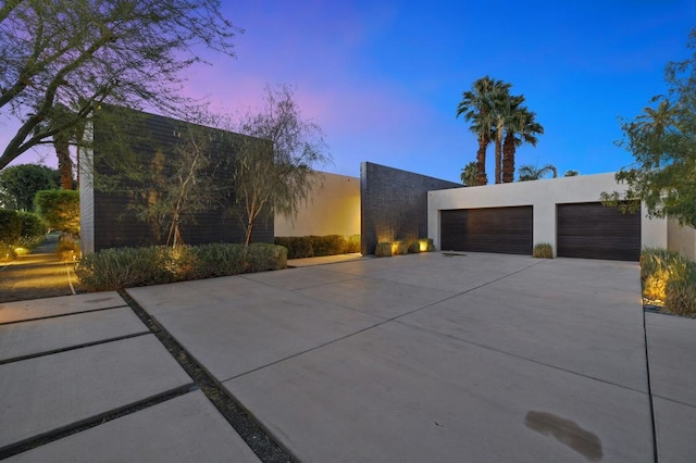 view of front of property featuring a garage