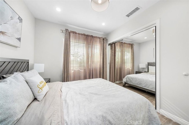 bedroom featuring hardwood / wood-style floors