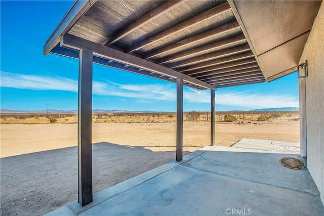 view of patio / terrace featuring a rural view