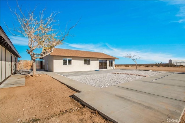 rear view of property with a patio