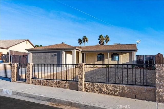 ranch-style home featuring a garage