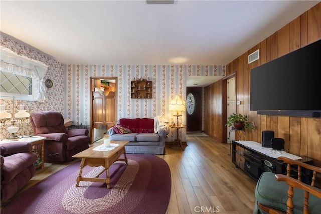 living room with light hardwood / wood-style floors