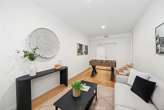 living room with light hardwood / wood-style floors