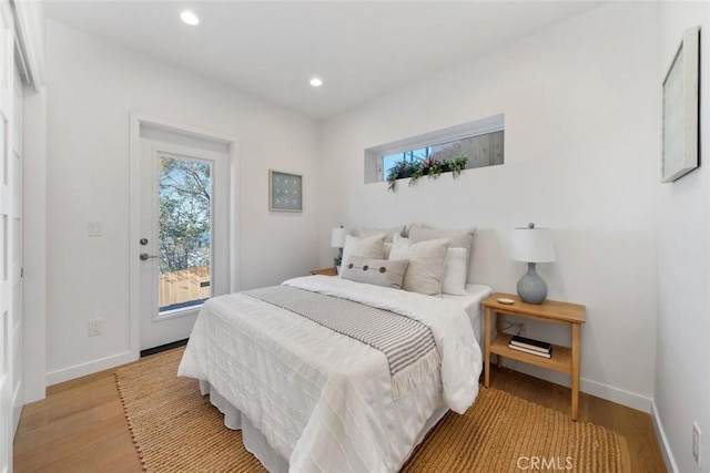 bedroom with light wood-type flooring