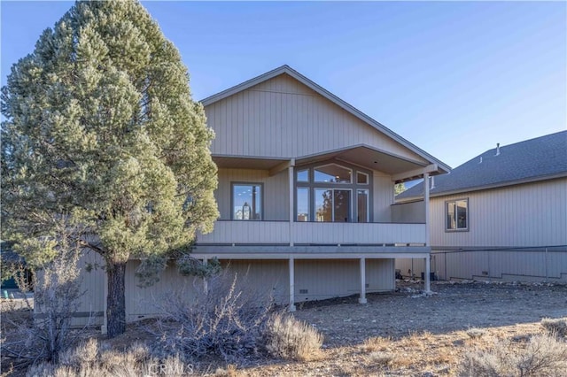 back of property featuring a sunroom