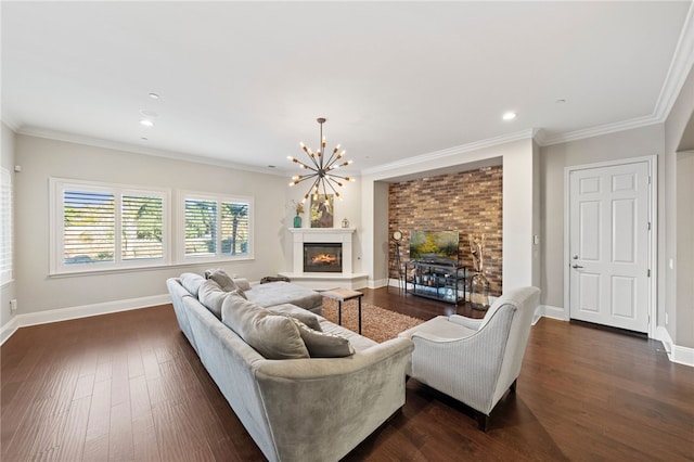 living room with ornamental molding, a chandelier, and dark hardwood / wood-style floors