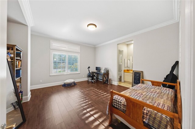 bedroom with ensuite bathroom, wood-type flooring, and crown molding