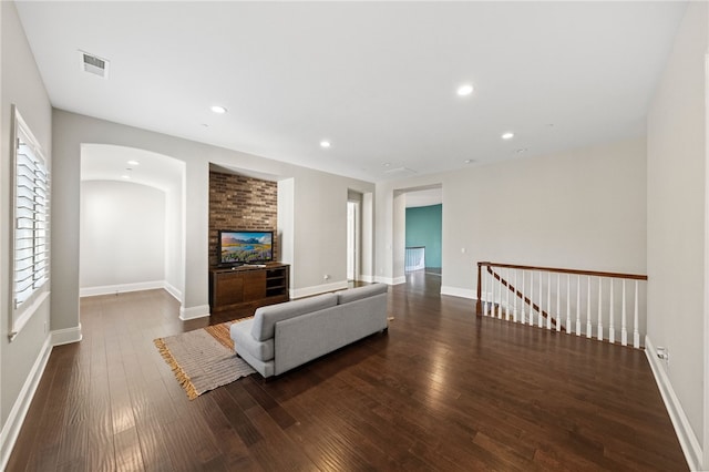 living room featuring dark hardwood / wood-style floors