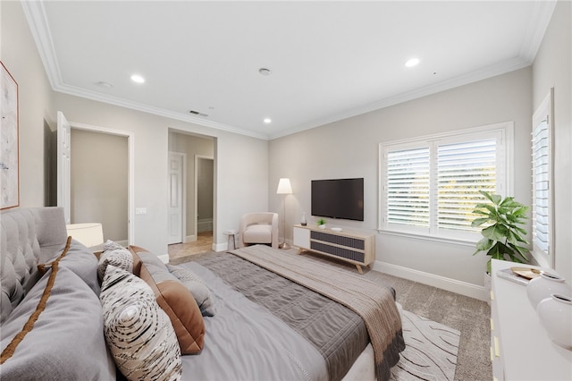 carpeted bedroom featuring crown molding