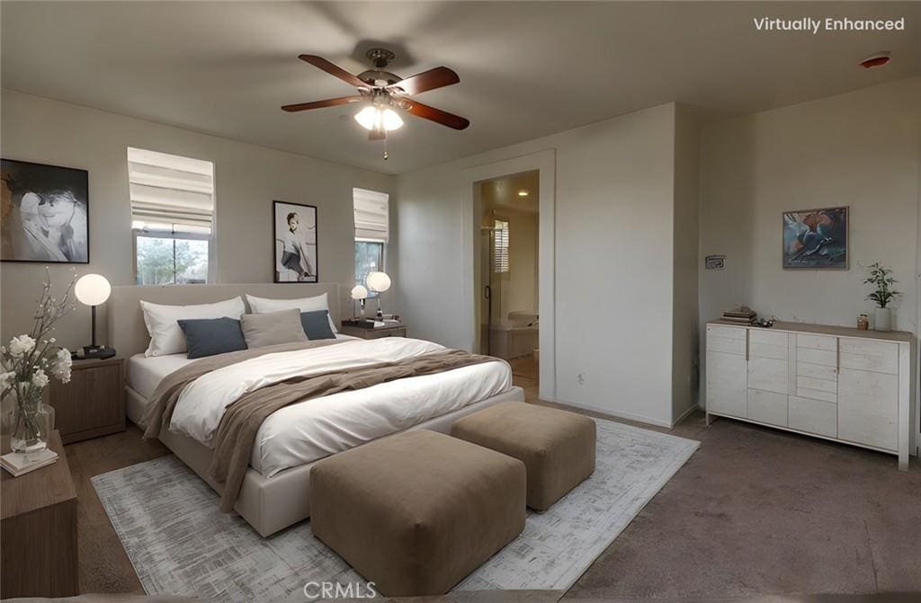 bedroom with ceiling fan and ensuite bath