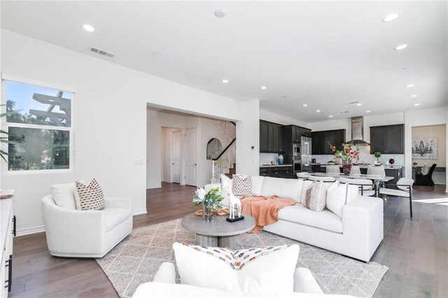 living room with light hardwood / wood-style floors