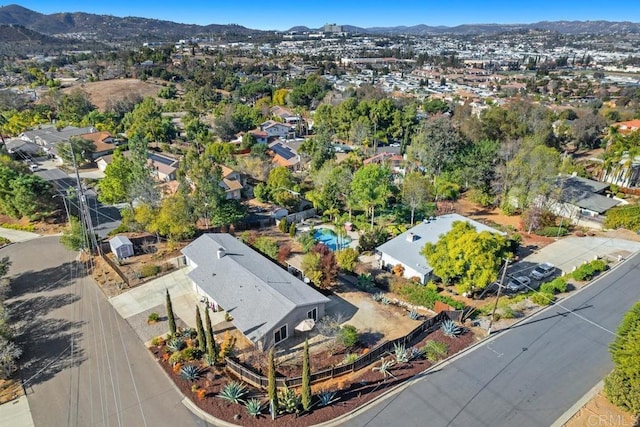 drone / aerial view featuring a mountain view