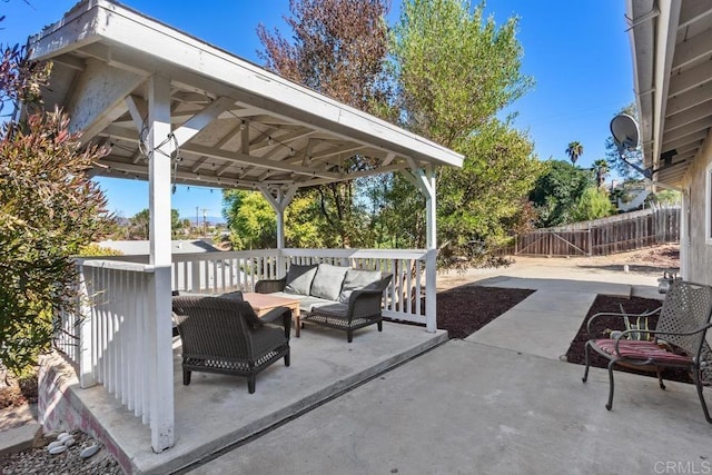 view of patio featuring outdoor lounge area and a gazebo