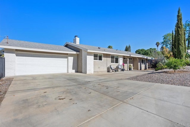 ranch-style home with a garage