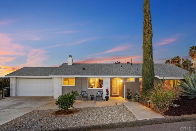 single story home featuring a garage