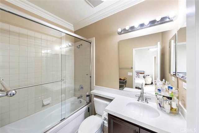 full bathroom featuring toilet, ornamental molding, connected bathroom, bath / shower combo with glass door, and vanity