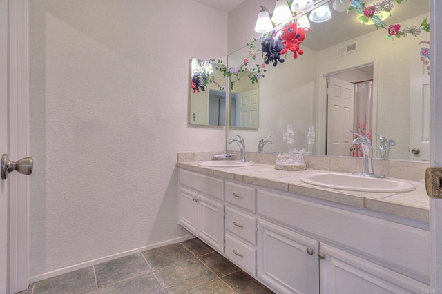 bathroom featuring vanity