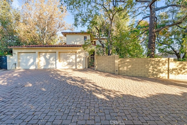 view of front of home featuring a garage