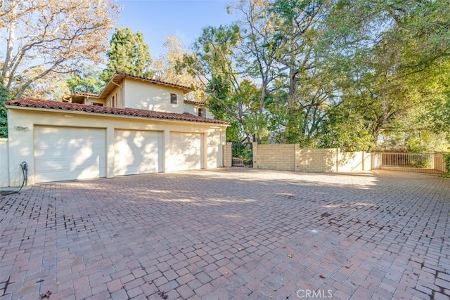 exterior space with a garage