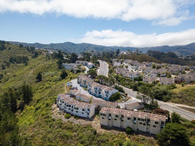 drone / aerial view featuring a mountain view