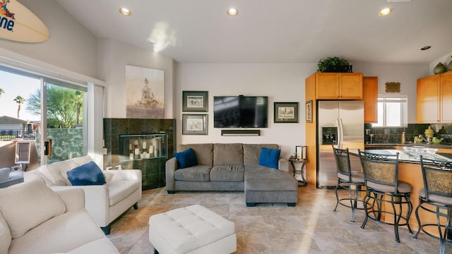 living room featuring a fireplace