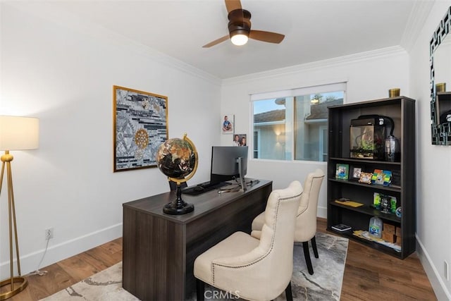 office area featuring ceiling fan, hardwood / wood-style floors, and ornamental molding