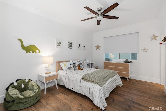 bedroom with ceiling fan, dark wood-type flooring, and crown molding