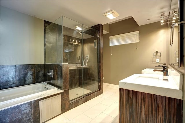 bathroom with vanity, tile patterned flooring, and independent shower and bath