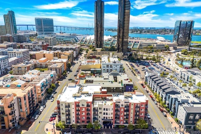 birds eye view of property featuring a water view