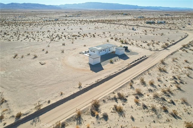 drone / aerial view featuring a mountain view