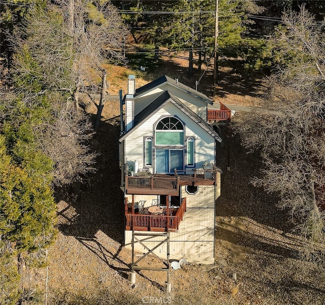 2477 Spring Oak Dr, Running Springs, CA 92382 - view of front facade with a chimney and a balcony
