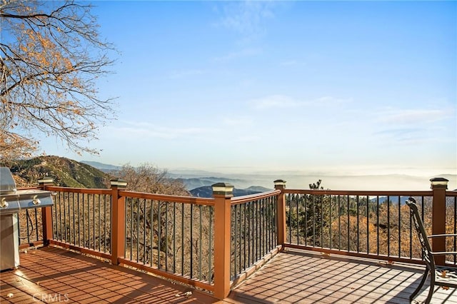 2477 Spring Oak Dr, Running Springs, CA 92382 - deck with area for grilling and a mountain view