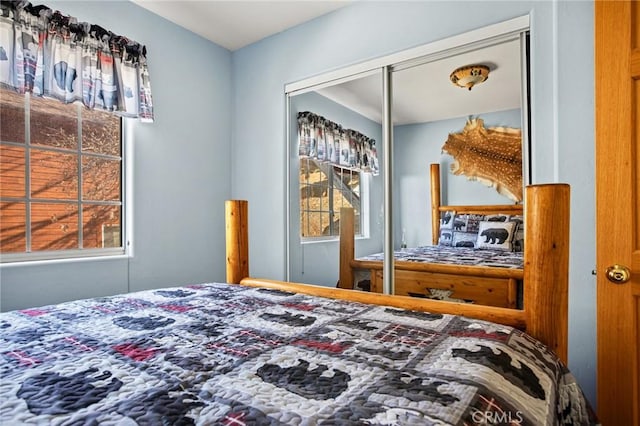 2477 Spring Oak Dr, Running Springs, CA 92382 - bedroom featuring multiple windows and a closet