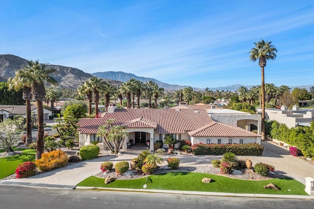 view of front of home with a mountain view