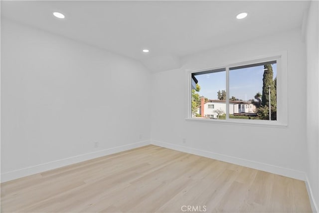 unfurnished room featuring light hardwood / wood-style floors