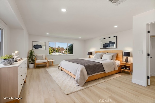 bedroom featuring light hardwood / wood-style floors