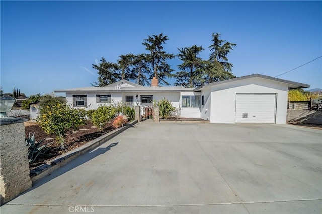 single story home featuring a garage