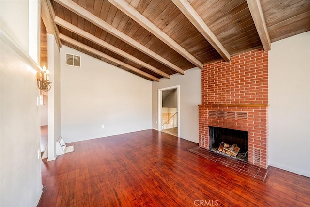 unfurnished living room featuring wooden ceiling, wood-type flooring, vaulted ceiling with beams, and a fireplace