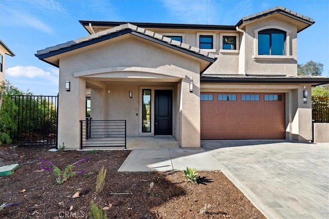 view of front of property featuring a garage